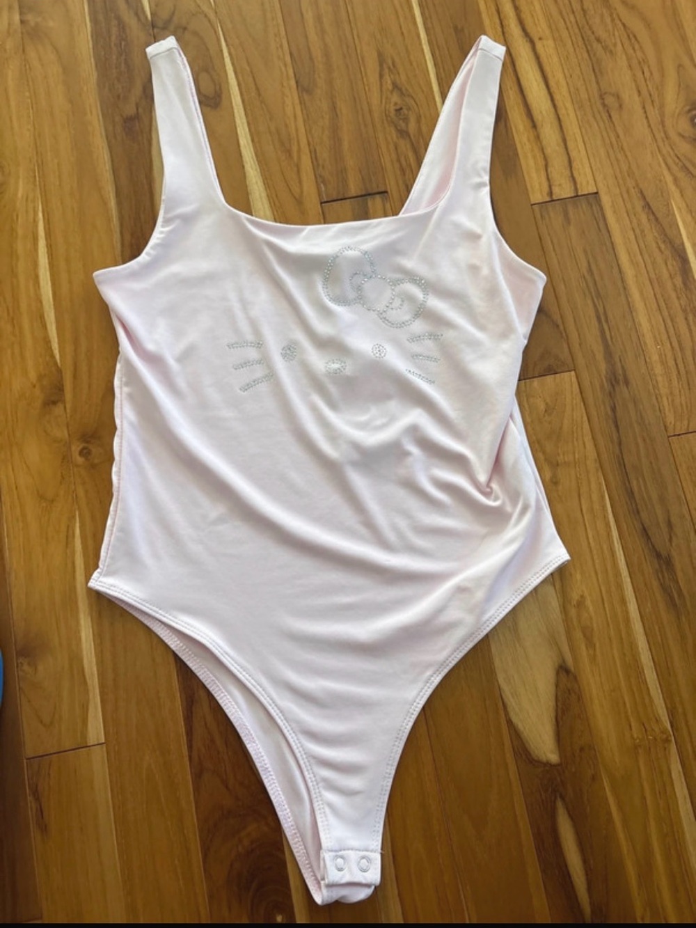 Hello Kitty Pink woman’s One-Piece Bodysuit size medium